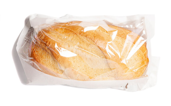 White bread in a paper bag isolated on white background