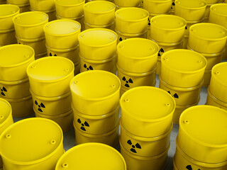 Group of yellow barrels with radiation hazard sign