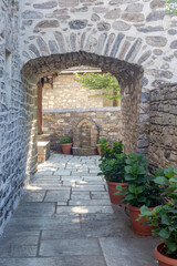 The inner courtyard of the Christian temple of Zoodochos Pigi in Vizitsa village (South Pelion, Prefecture of Magnesia, Greece)