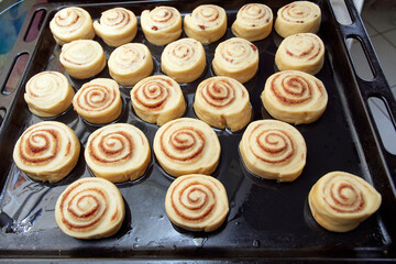 Sweet cinnamon rolls ready to bake in the oven