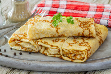stuffed pancake on a wooden board