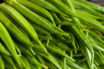 Heap of okra aka ladie's fingers on a vegetable market