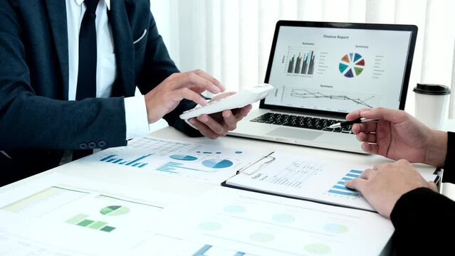 Business meeting, Brainstorming between financiers and accountants analyzing data to plan a company's tax breaks and cost savings, Business Strategy Modification, Working together.