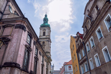 Church of the Assumption of the Blessed Virgin Mary (Kościół Wniebowzięcia Najświętszej Marii Panny) surrounded by historical buildings of the Old Town in Nysa, Poland.