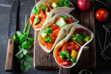 Vegetarian and healthy tacos as spicy Mexican snack.
