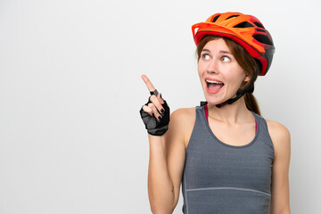 Young cyclist English woman isolated on white background intending to realizes the solution while lifting a finger up