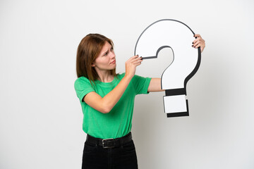 Young English woman isolated on white background holding a question mark icon
