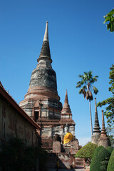 Fototapeta premium Wat Yai Chaimongkol. ancient buddha Wat Yai Chaimongkol Ayutthaya historical city, Thailand, beautiful blue sky