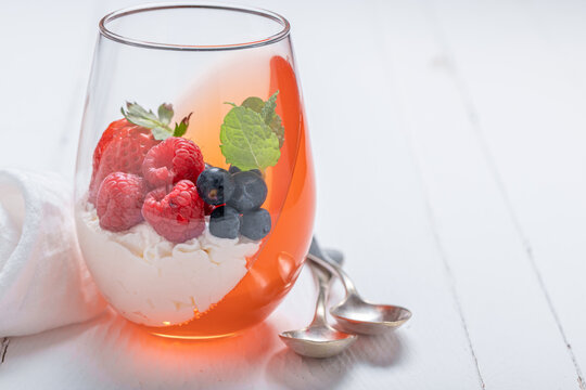 Creamy and delicious jelly with raspberries, blueberries and cream.