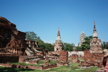 Fototapeta premium Wat Yai Chaimongkol. ancient buddha Wat Yai Chaimongkol Ayutthaya historical city, Thailand, beautiful blue sky
