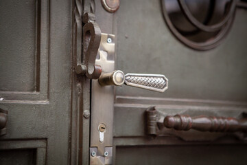 Fototapeta na wymiar old metal door and handle