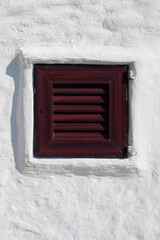 close up of a typical house of menorca made of lime and wood