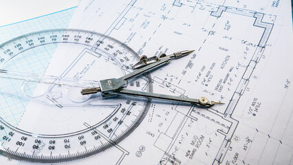 Fototapeta na wymiar Office blue print with drawing compass and ruler
