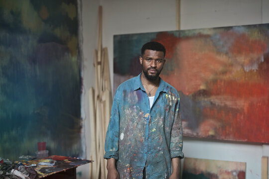 young man in a painting studio
