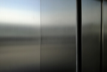 Reflection of light on a shiny metal texture,stainless steel background.