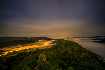 Viewpoint looking from Aiyoeweng Sky walk with mist in the morning very beautiful, there are many tourists go to visit, Betong, Yala, Thailand. - obrazy, fototapety, plakaty