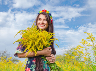 portrait of a girl in a flower wreath