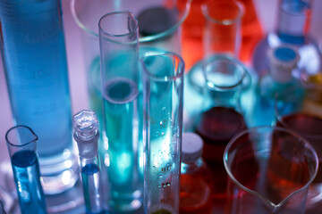 laboratory equipment with liquids of different colors