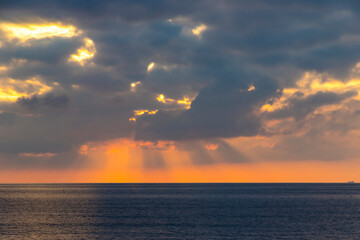 Sunset over the Tyrrhenian Sea in Milazzo town, Sicily island, Italy. Tyrrhenian Sea is a part of the Mediterranean Sea off the western coast of Italy