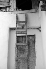 classic handmade wooden ladder for climbing on the roof,