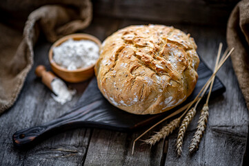 Fresh homemade bread on a wooden table