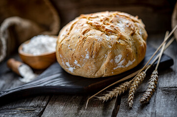Fresh homemade bread on a wooden table