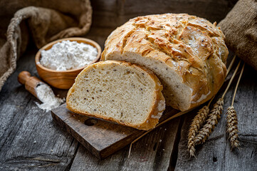 Fresh homemade bread on a wooden table