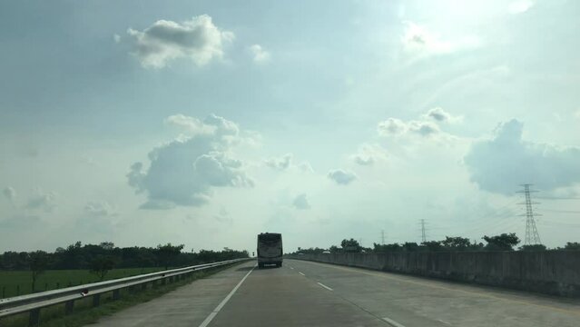 Point of view driving on toll road highways, East java, Indonesia