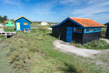 Colourful oyster farming fishing huts at Fort Royer, Oleron Island, Charente Maritime, France
