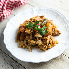 Wok noodles with chili and potato