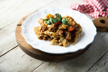 Wok noodles with chili and potato