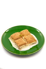Cold baklava. Baklava with milk isolated on a white background. Mediterranean cuisine delicacies. Close-up. Local name soguk baklava