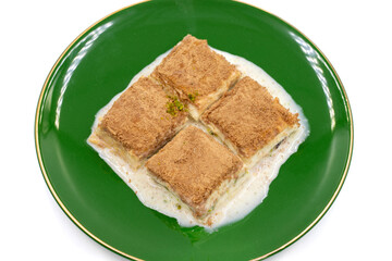 Cold baklava. Baklava with milk isolated on a white background. Mediterranean cuisine delicacies. Close-up. Local name soguk baklava