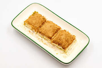 Cold baklava. Baklava with milk isolated on a white background. Mediterranean cuisine delicacies. Close-up. Local name soguk baklava