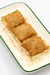 Cold baklava. Baklava with milk isolated on a white background. Mediterranean cuisine delicacies. Close-up. Local name soguk baklava