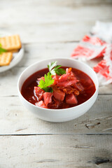 Traditional homemade beetroot soup with fresh parsley