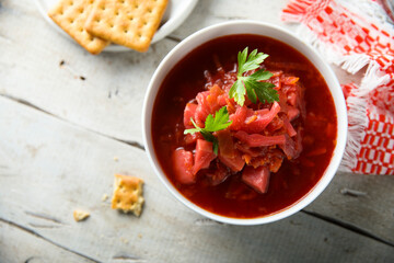 Traditional homemade beetroot soup with fresh parsley