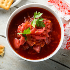 Traditional homemade beetroot soup with fresh parsley