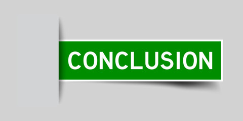 Inserted green color label sticker with word conclusion on gray background