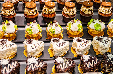various fresh cakes dessert in supermarker