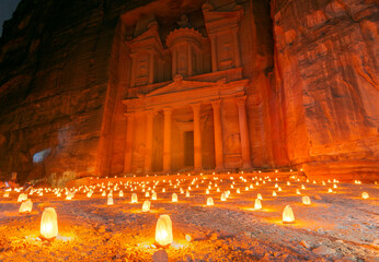 Petra by night (candlelit) and the Treasury monument (Al-Khazneh) in Petra archaeological site,...