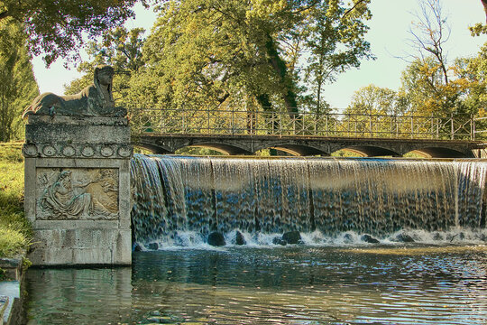 Waterfall cascade at the famous old Laxenburg Castle in Austria on a sunny d