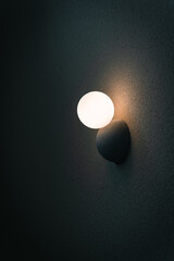 Beautiful modern wall lamp light decoration white ball shape for home and living on the wall background with copy space for text.