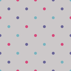 Dots of different colors on a gray background. Seamless background for any use.