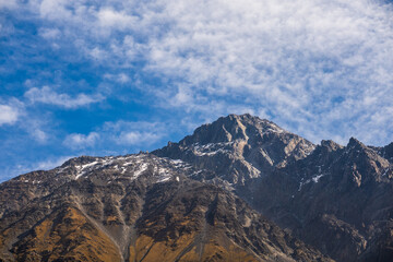 Mountain ridge against blue sky
