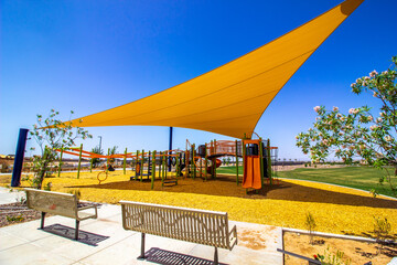 Children's Play Area With Stretched Canopy For Shade
