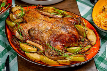 Baked duck with apples on the festive table