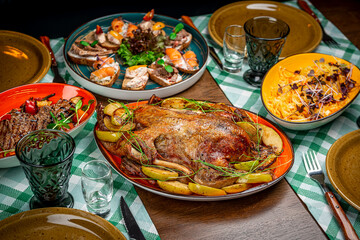 Baked duck with apples on the festive table