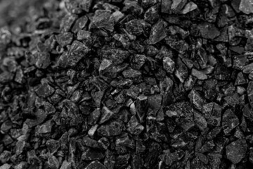 Natural black coals for background. Industrial coals.It can be used as a fuel for coal industry. Pea coal. Top view