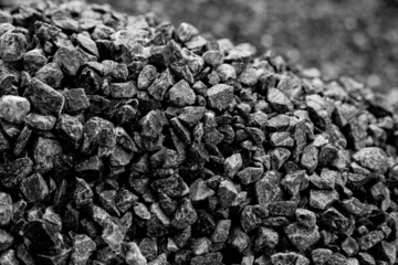 Natural black coals for background. Industrial coals.It can be used as a fuel for coal industry. Pea coal. Top view